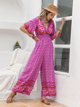 Load image into Gallery viewer, Flutter Sleeve Floral Jumpsuit
