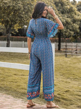 Load image into Gallery viewer, Flutter Sleeve Floral Jumpsuit
